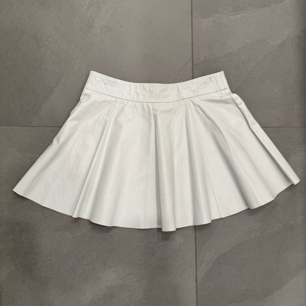 White flare pleated mini leather skirt